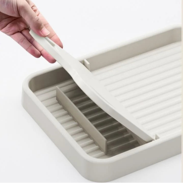 מתקן רב-שימושי למכסים וכפות – נוחות מקסימלית בזמן הבישול!